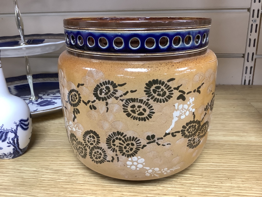 A quantity of mixed Royal Doulton ceramics - 8 vases, a cake stand and a flower pot